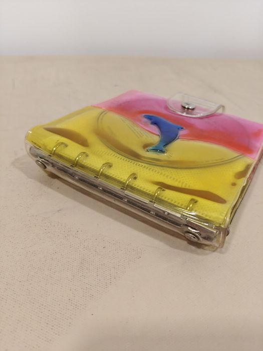 Estojo/ Porta CDs com argolas - capacidade para 24 CDs