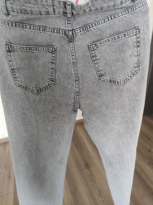 Джинси палацо в новому стані