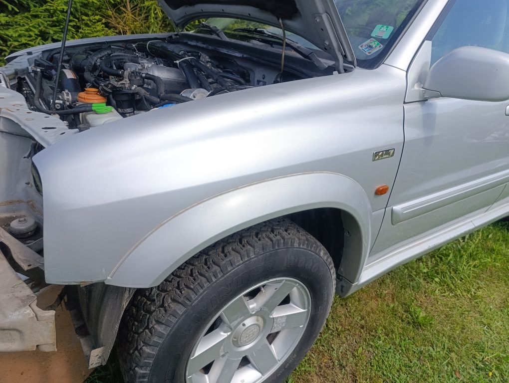 Błotnik Suzuki Grand Vitara xl7