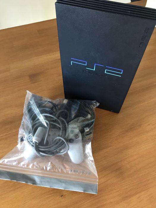 PS2 fat + comando + jogos