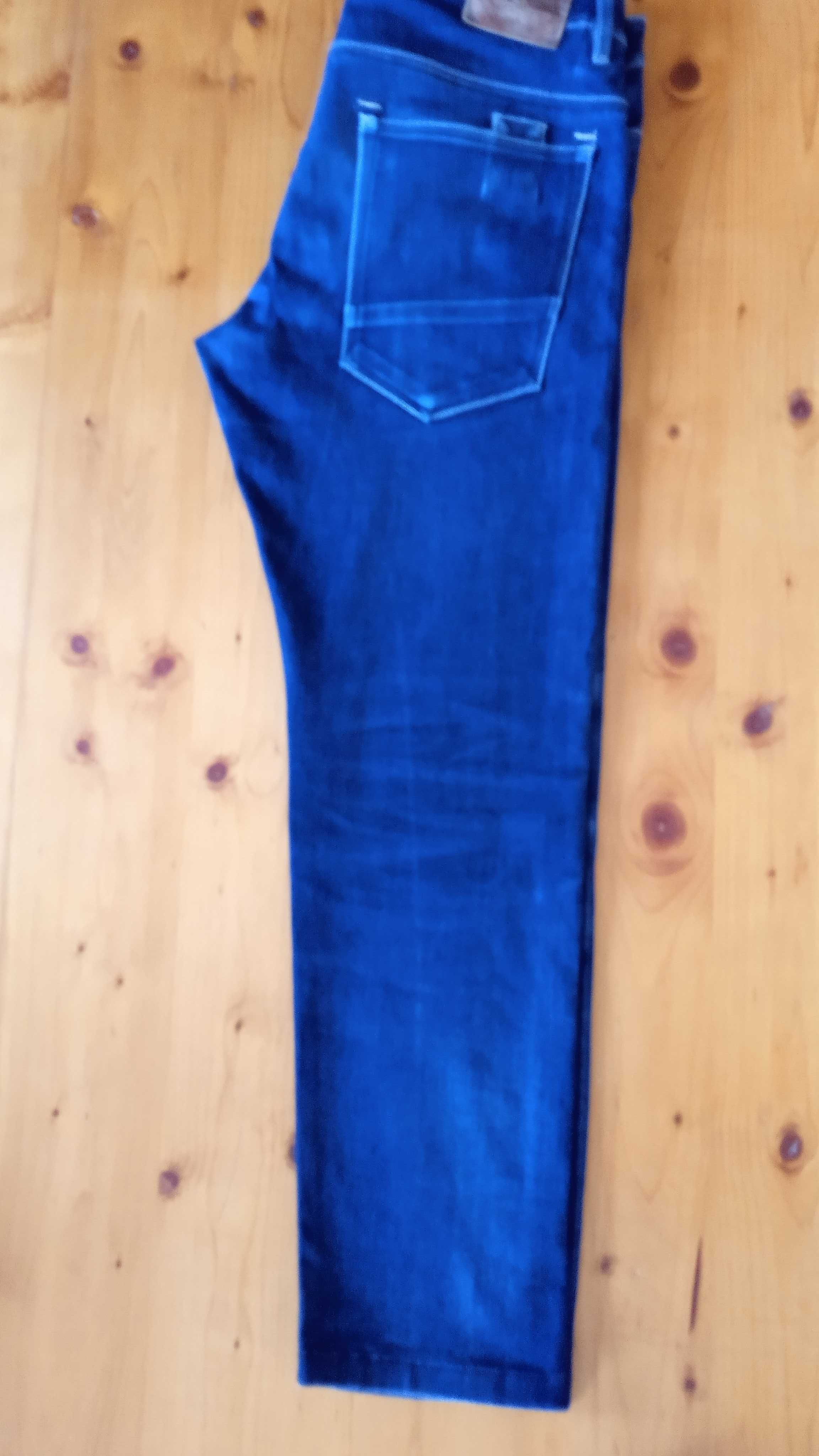 Spodnie męskie RESERVED jeansy, rozmiar L 32.