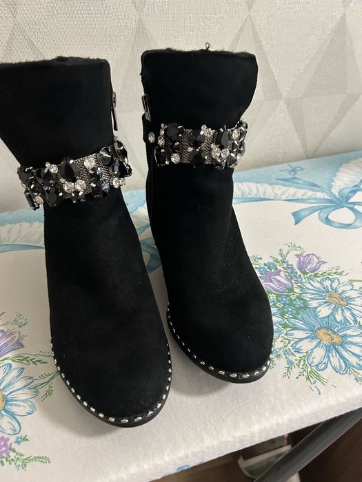 Женские сапоги.