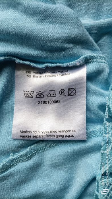 Błękitna bluzka z koronką. Hanna
