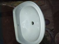 Умивальник новий