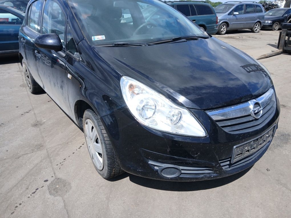 Opel Corsa d maska I inne 1.3