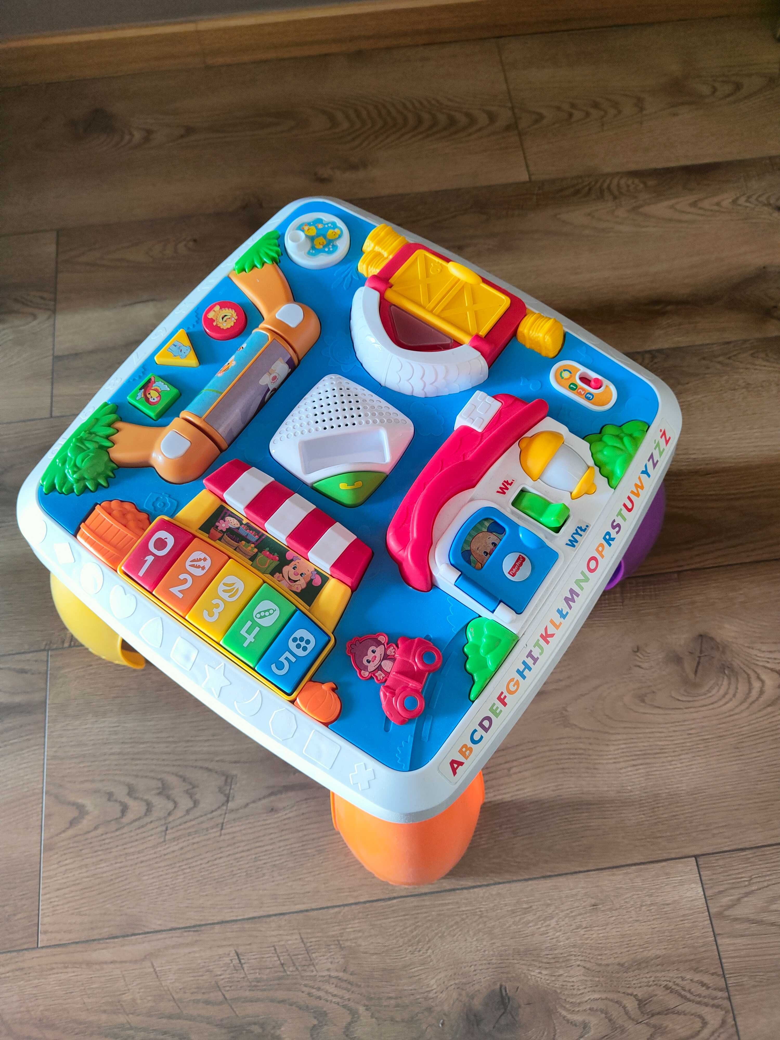 Fisher price stolik edukacyjny