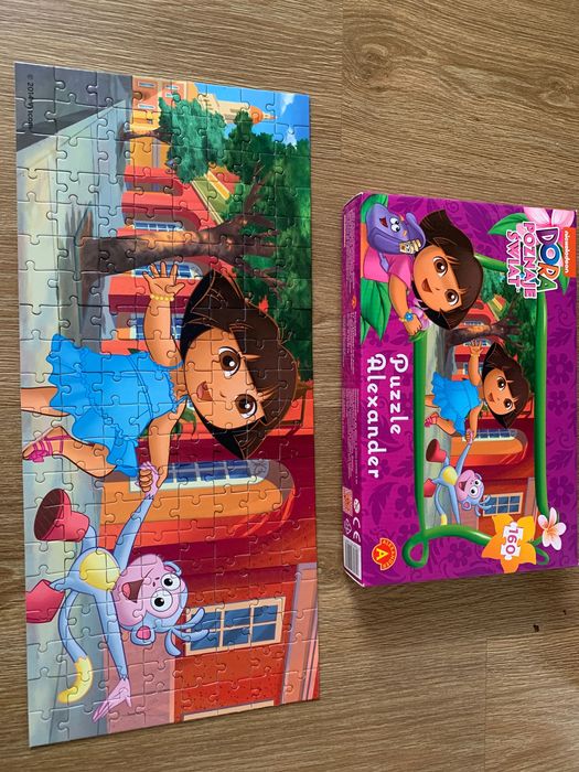 Puzzle Dora poznaje świat 160 elementów.