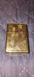 Isqueiro Zippo dourado em bom estado