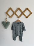 Pajac h&m 56 miętowy prążkowany w liski