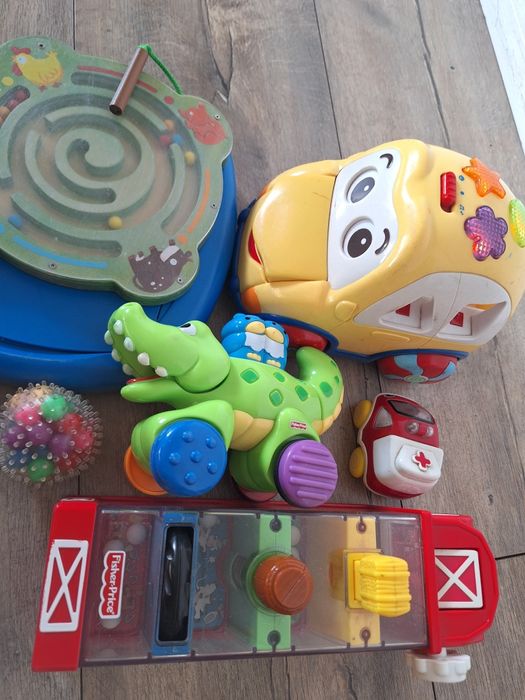 Paczka zabawek Vtech Fisher Price grające sensoryczne