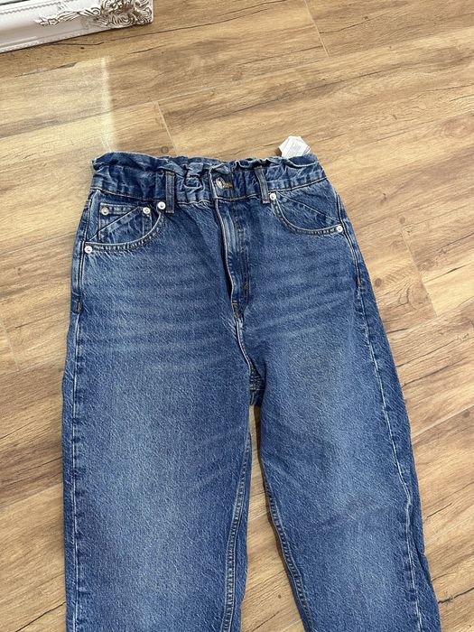 Джинси в вдкальному стані