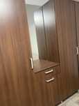 Продам стенку из трех шкафов, над тумбой зеркало Цвет темный не полиро