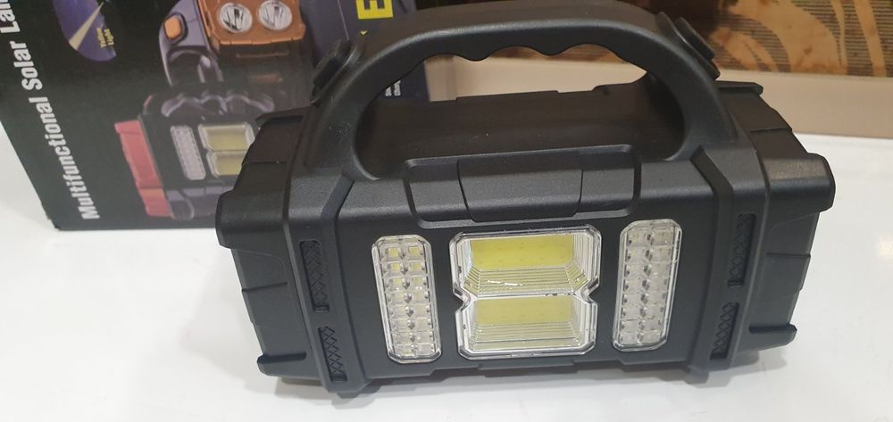 Современный многофункциональный фонарь с солнечной панелью .