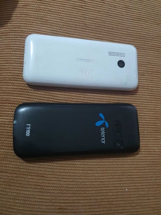 2 telemóveis com teclas Nokia e outro