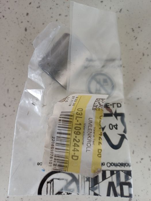 Ролик ременя ГРМ обхідний VAG 03L 109 244 D