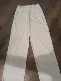 Білі штани  з легкого матеріалу на літо