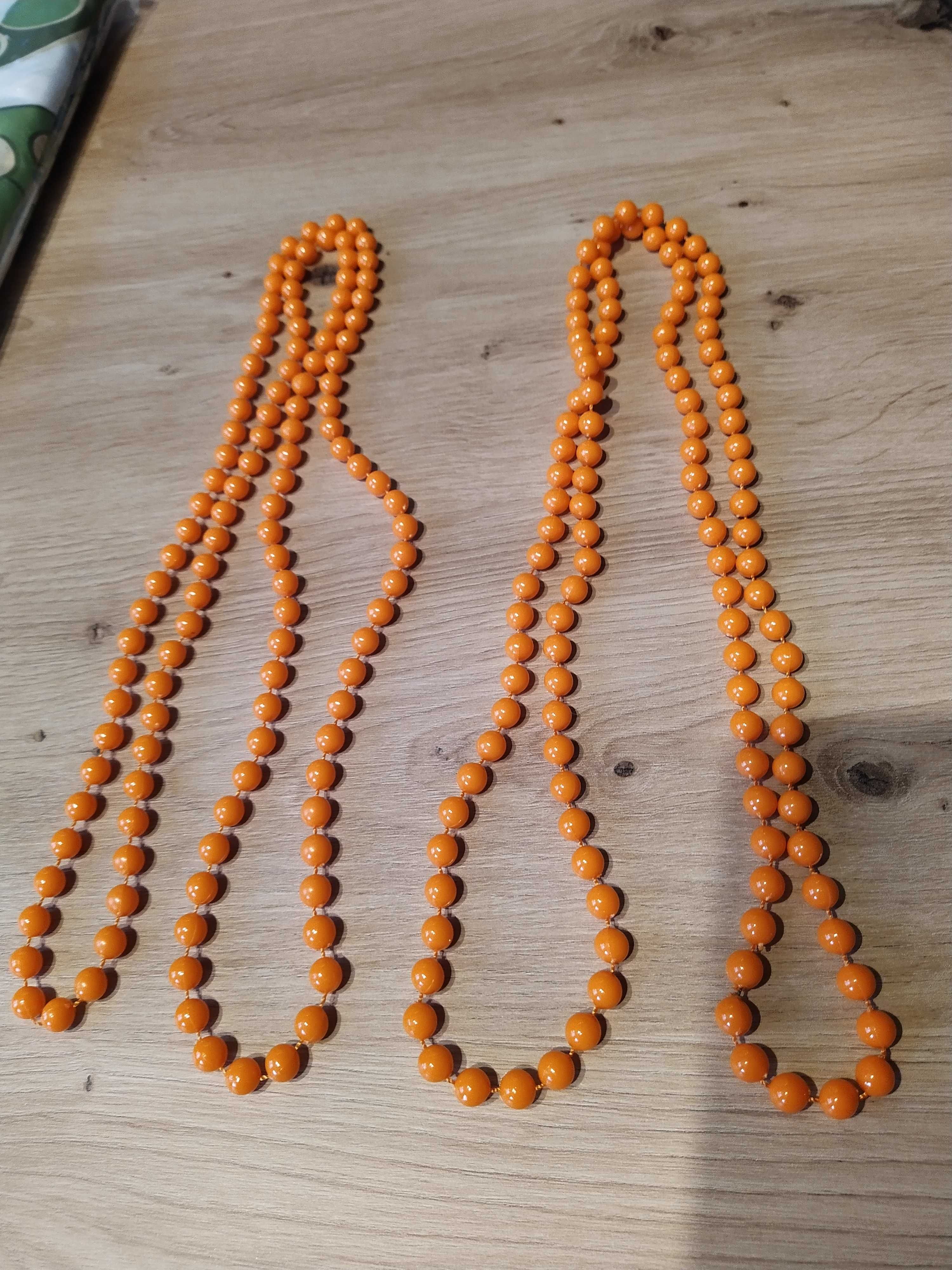 Plastikowe pomarańczowe korale, dwa długie sznury