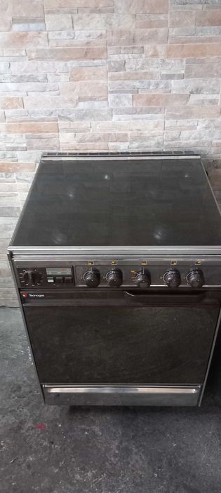 fogao a gas canalizado com quatro bicos e forno inox