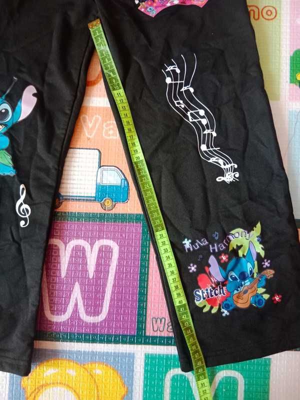 Nowe spodnie dziewczęce dresowe Stich 7-8Y