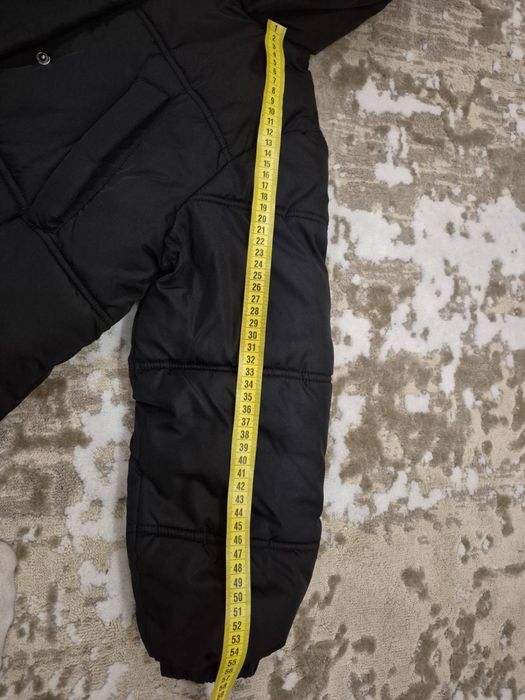 Продам пуховик next на дівчинку