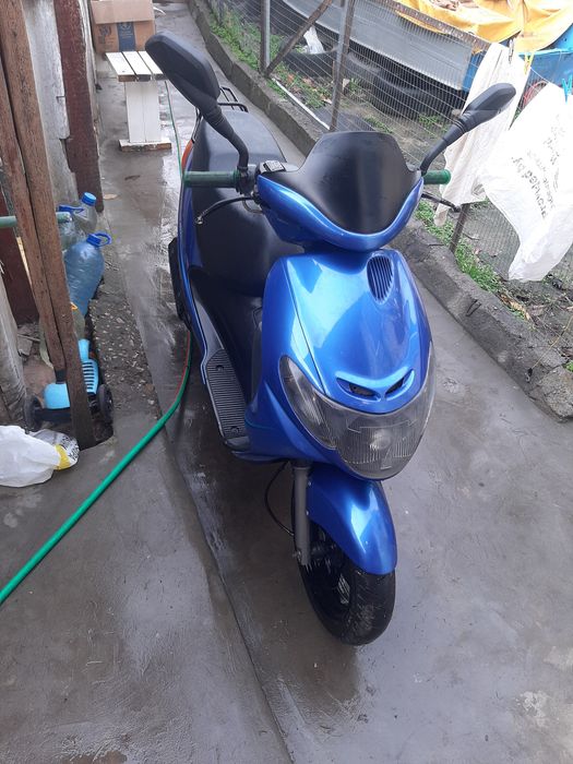 Скутер Сузуки адресс