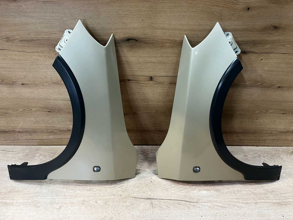 Błotnik przedni lewy prawy Skoda Fabia II Scout kolor 9205