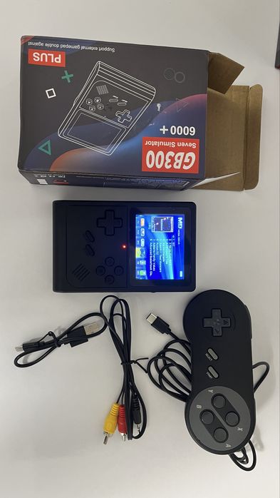 Нова портативна ігрова приставка з іграми денді сега та інші