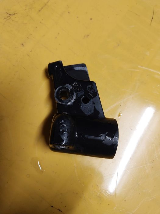 Uchwyt mocowanie lewej dźwigni hamulca klamki hamulca piaggio typhoon