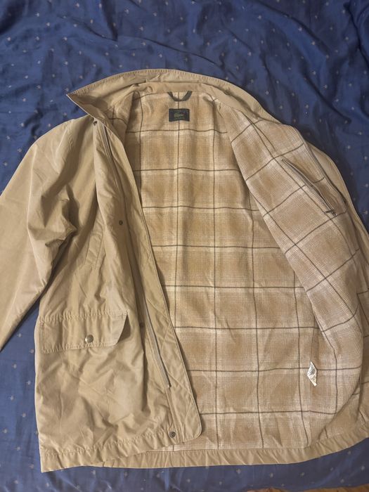 Демісезонна унісекс куртка lacoste бежевого кольору