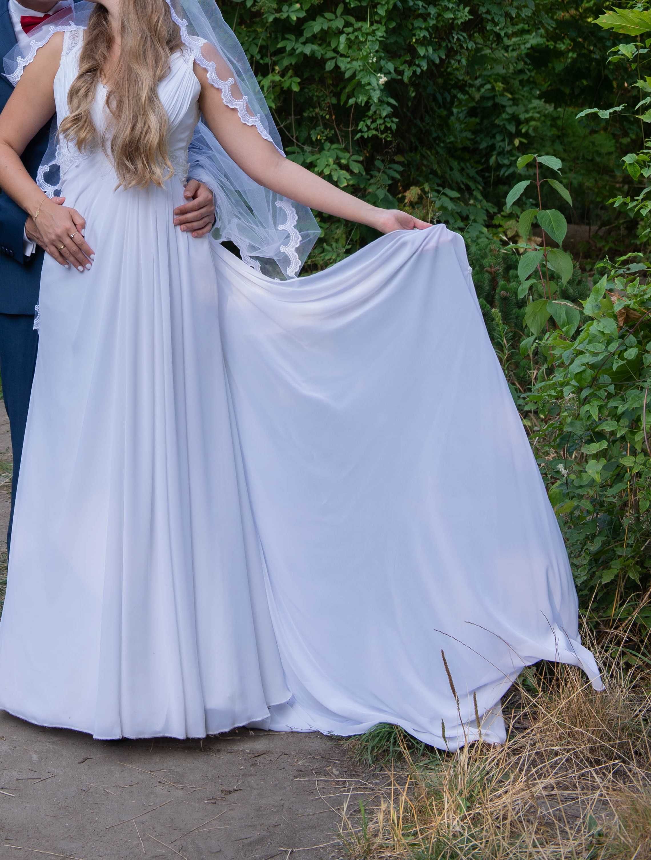 wyjątkowa suknia ślubna piękna biel