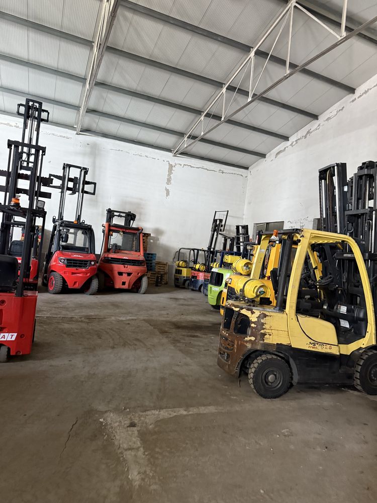 Empilhador 4 caminhos Bauman de 3500 kgrs eleva a 7 metros bateria niv