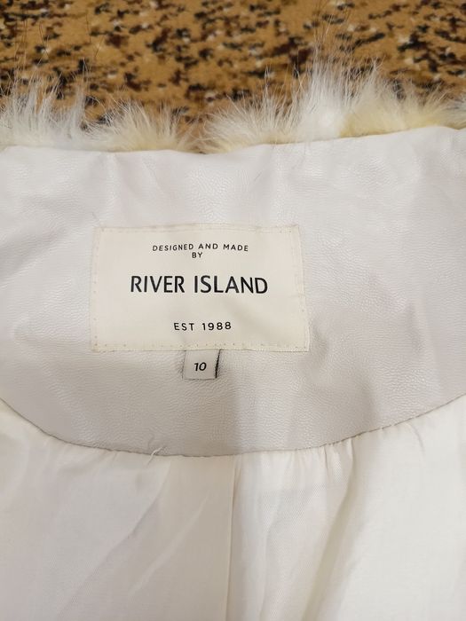 Желетка із хутра жіноча