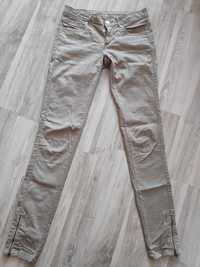 Spodnie wzorek beżowe XS