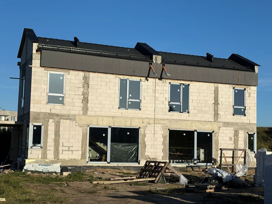 Zlecę wykonanie elewacji w kilku małych budynkach.