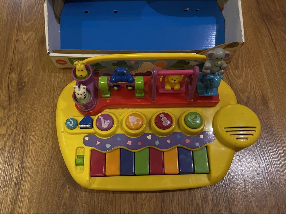 Продам Игрушка Пианино Зверята на качелях для малышей Kiddieland