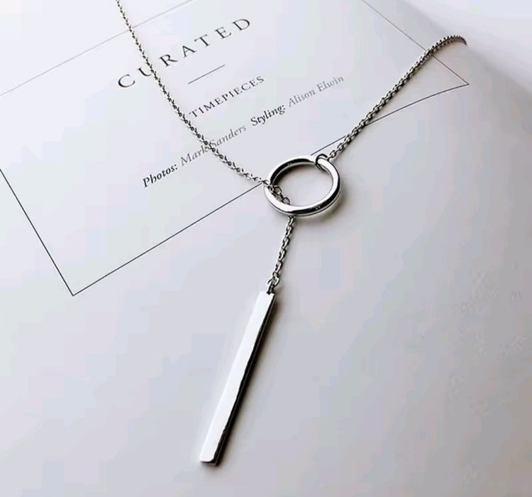 Підвіска на шию срібляста