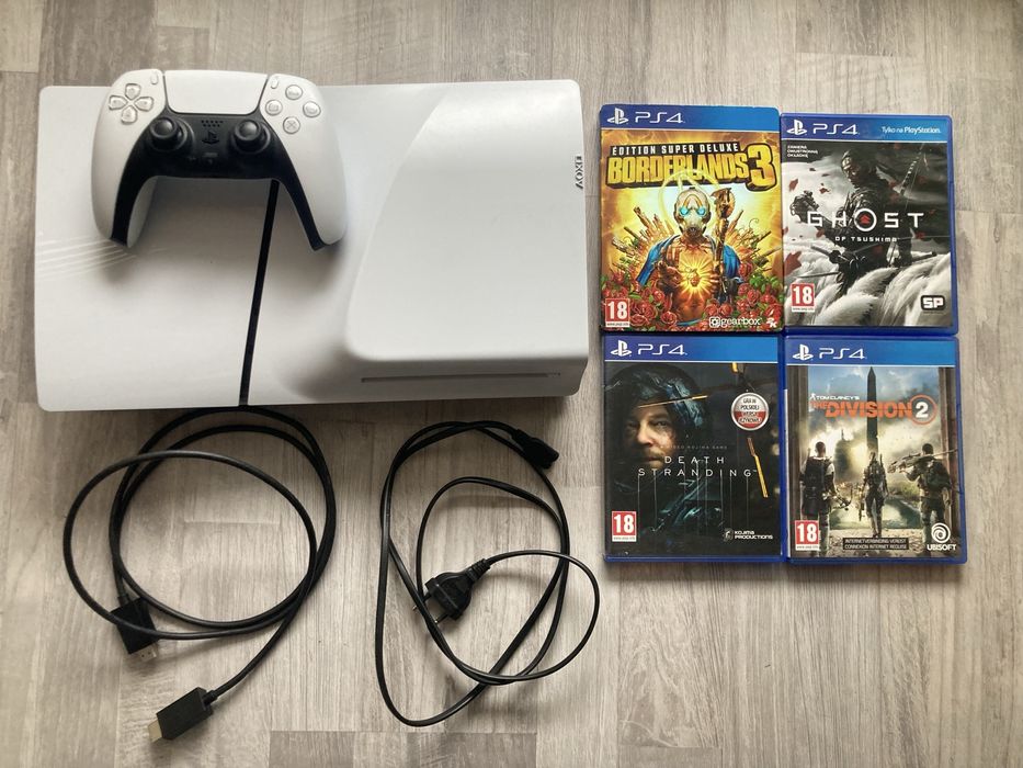 PS5 Slim z napędem + 4 gry