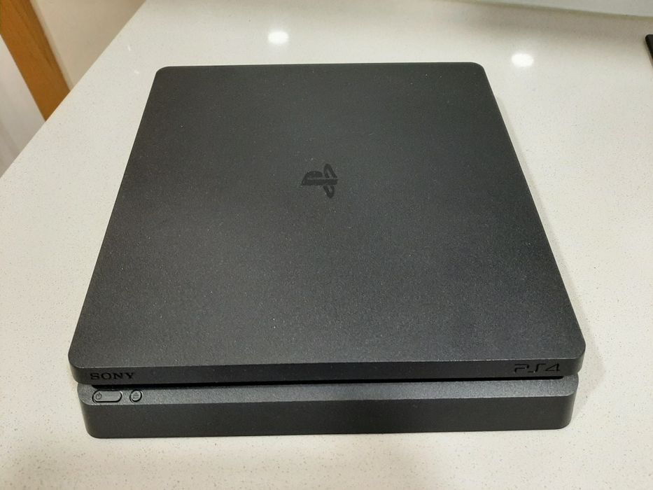 PlayStation 4 + 1 Comando + Jogos