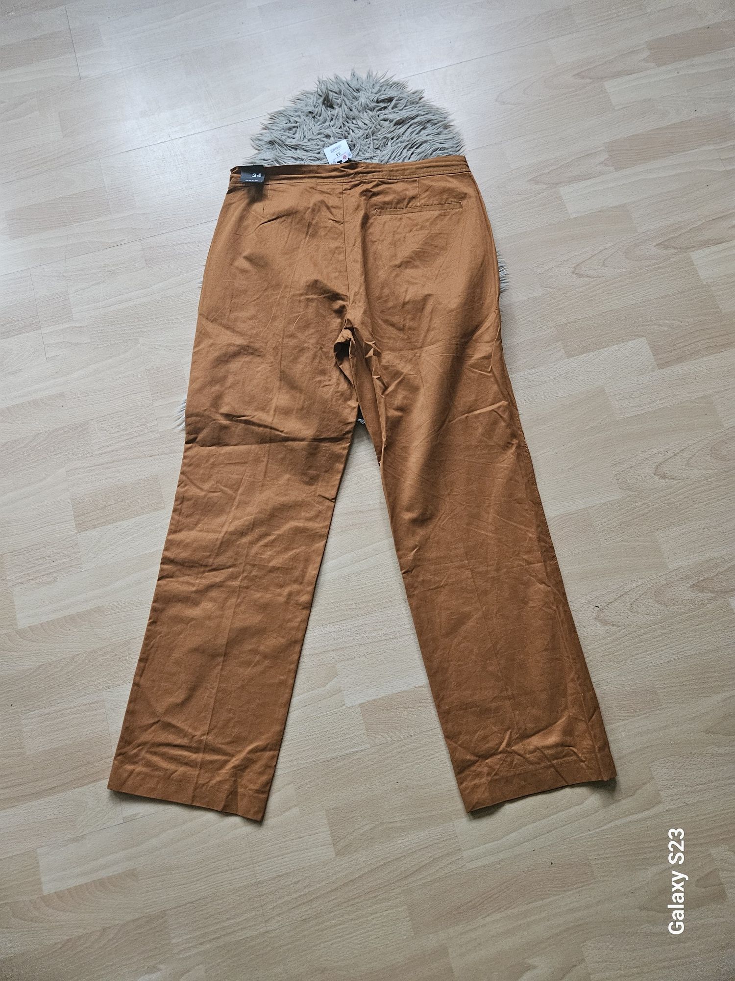 Męskie spodnie reserved long fit 34