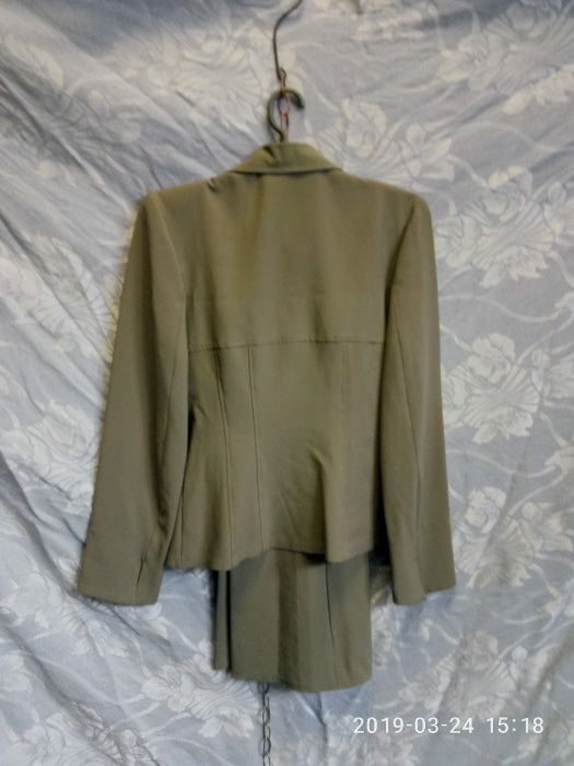 Новый 33 Костюм брючный женский Размер S