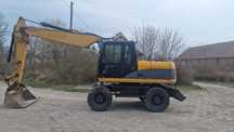 Caterpillar M 315 D  koparka kolowa Cat sprowadzona gotowa do pracy .