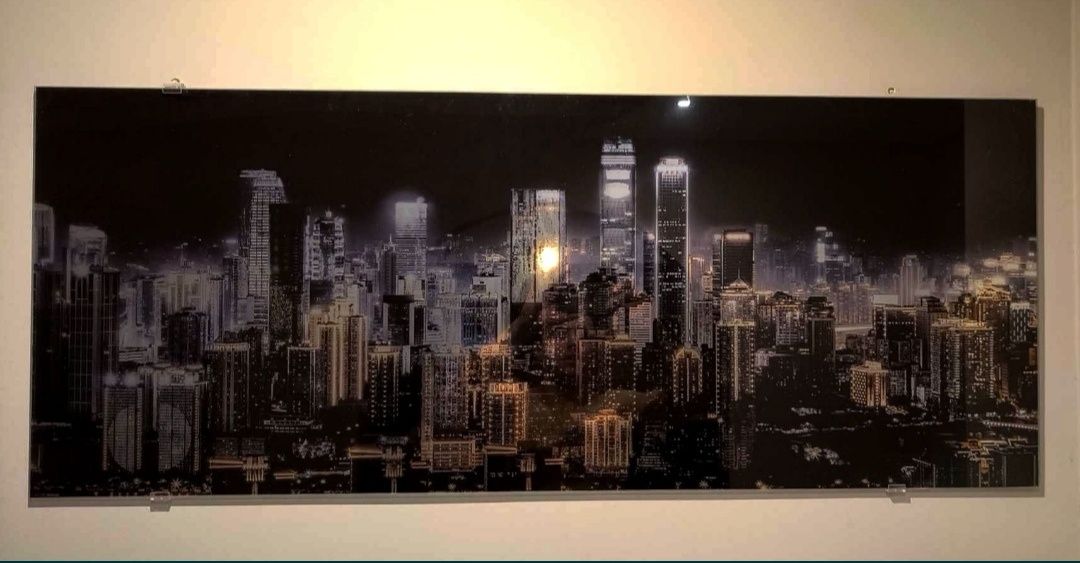 Duży szklany obraz czarny miasto krajobraz na szkle złoty 125x50
