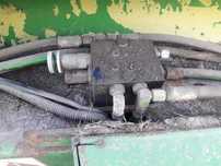 Regeneracja zaworu zgniotu , i wiele  części John deere 550. 545.