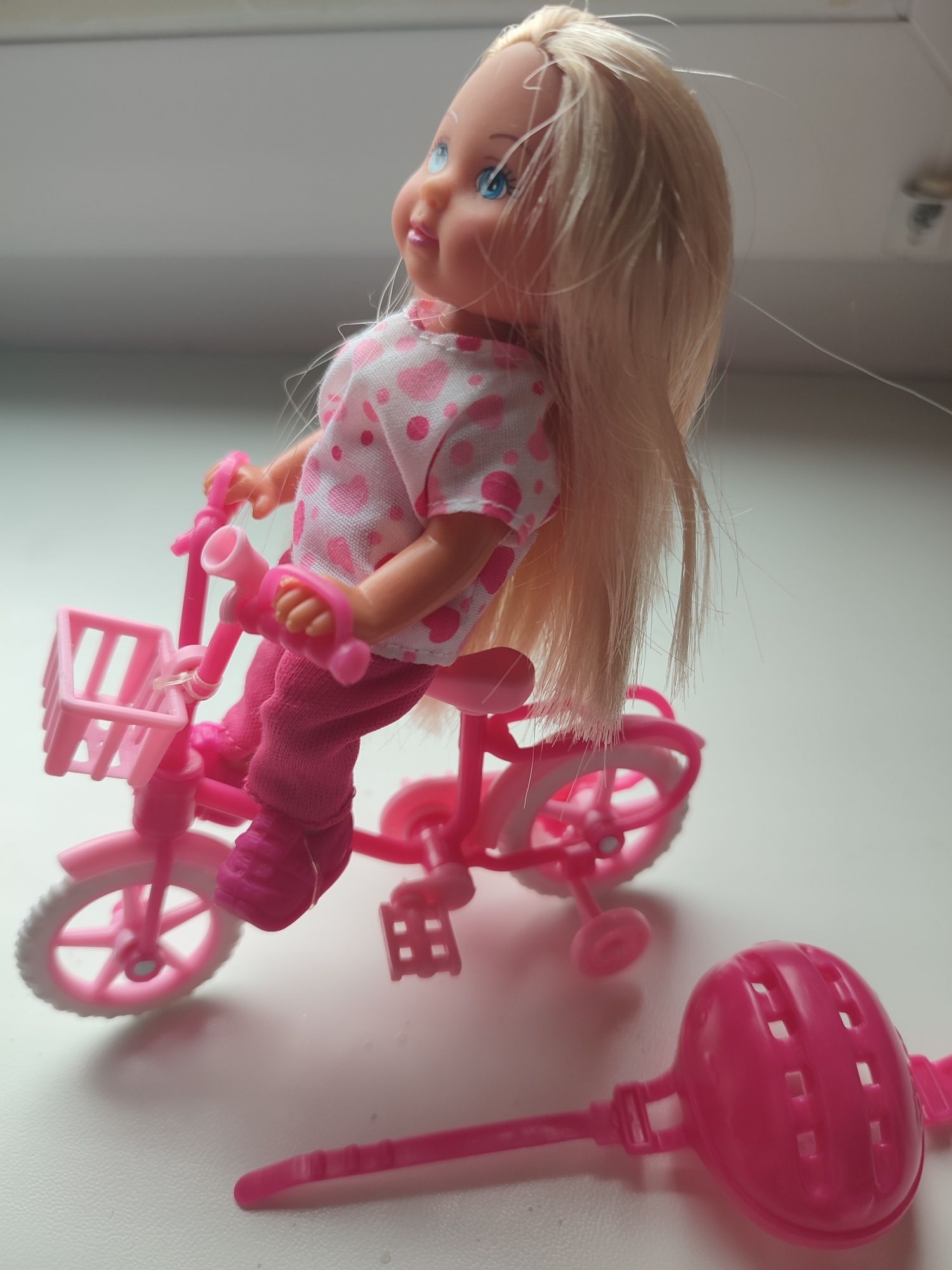 Лялечка на велосипеді