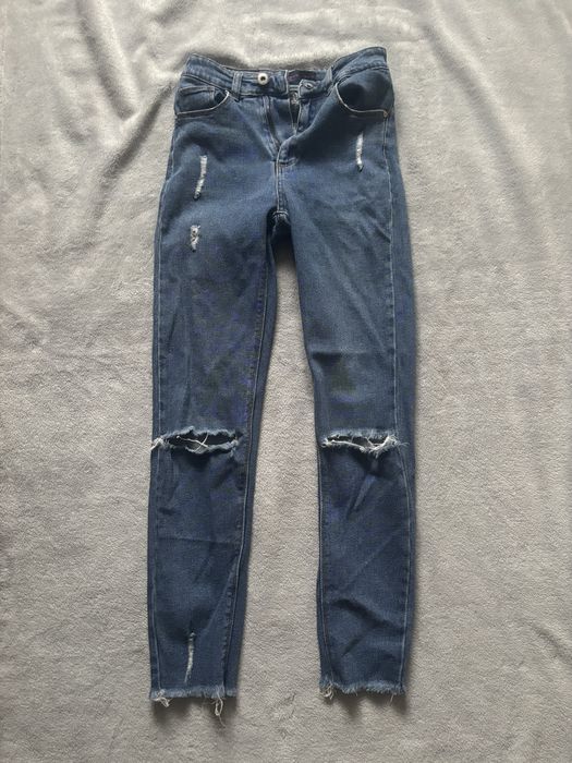 Jeansy z dziurami cropp