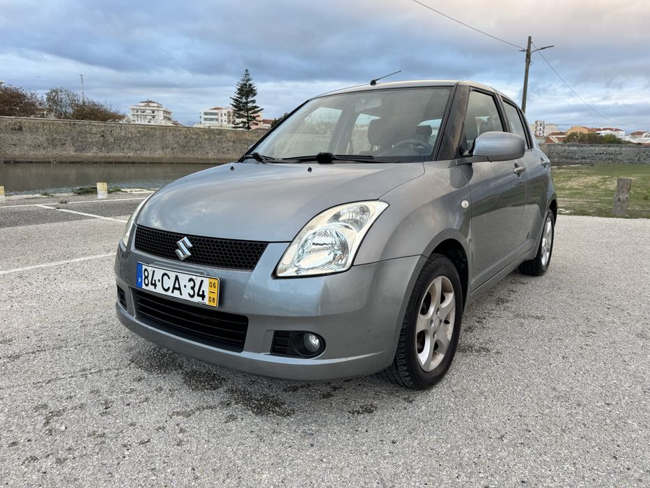 Suzuki Swift 2006 Automatico poucos kms 4.8 l/100 mto economico