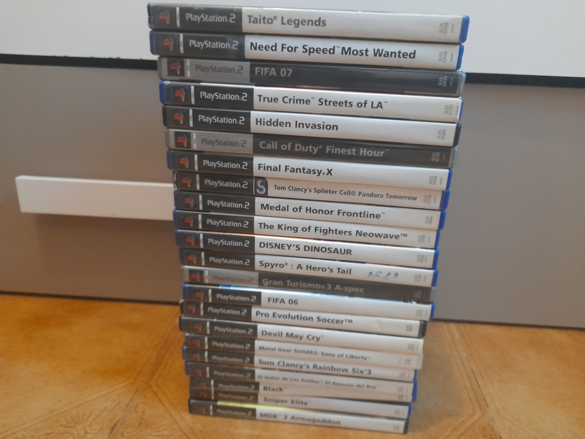 Ps2 em perfeito estado com 3 comandos  22 jogos