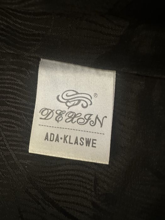 Шуба натуральна ,стрижена овчина чорного кольору.