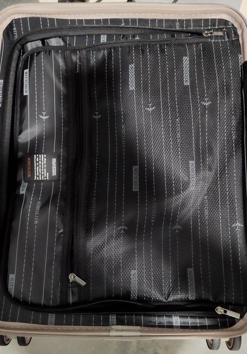 Walizka kabinowa z polikarbonu z kieszenią na laptopa 15" szampańska