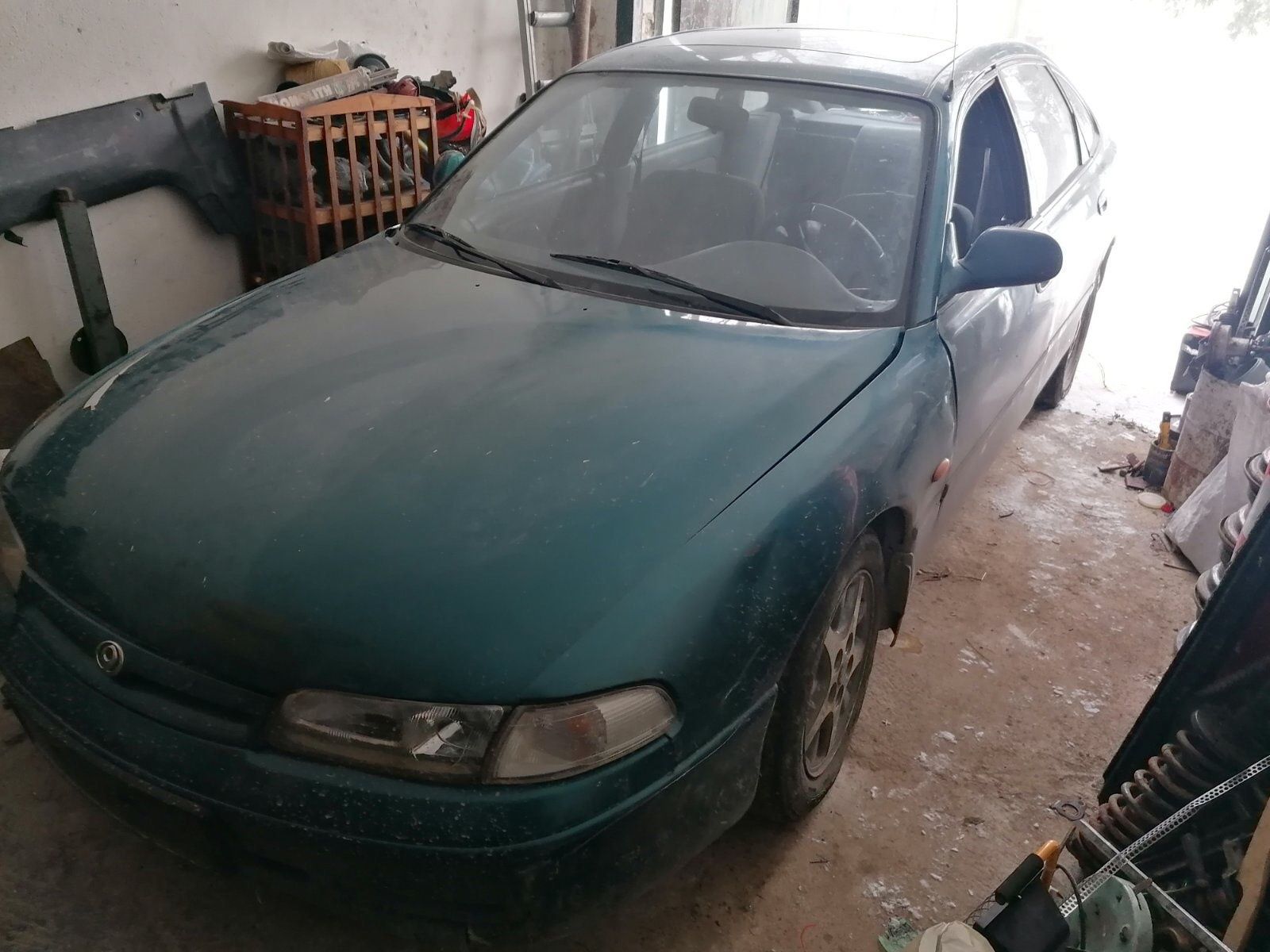 Запчастини Mazda 626 GE Дверка.